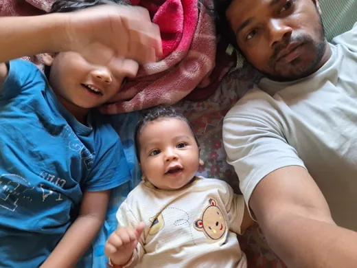 Our little one cuddling with family