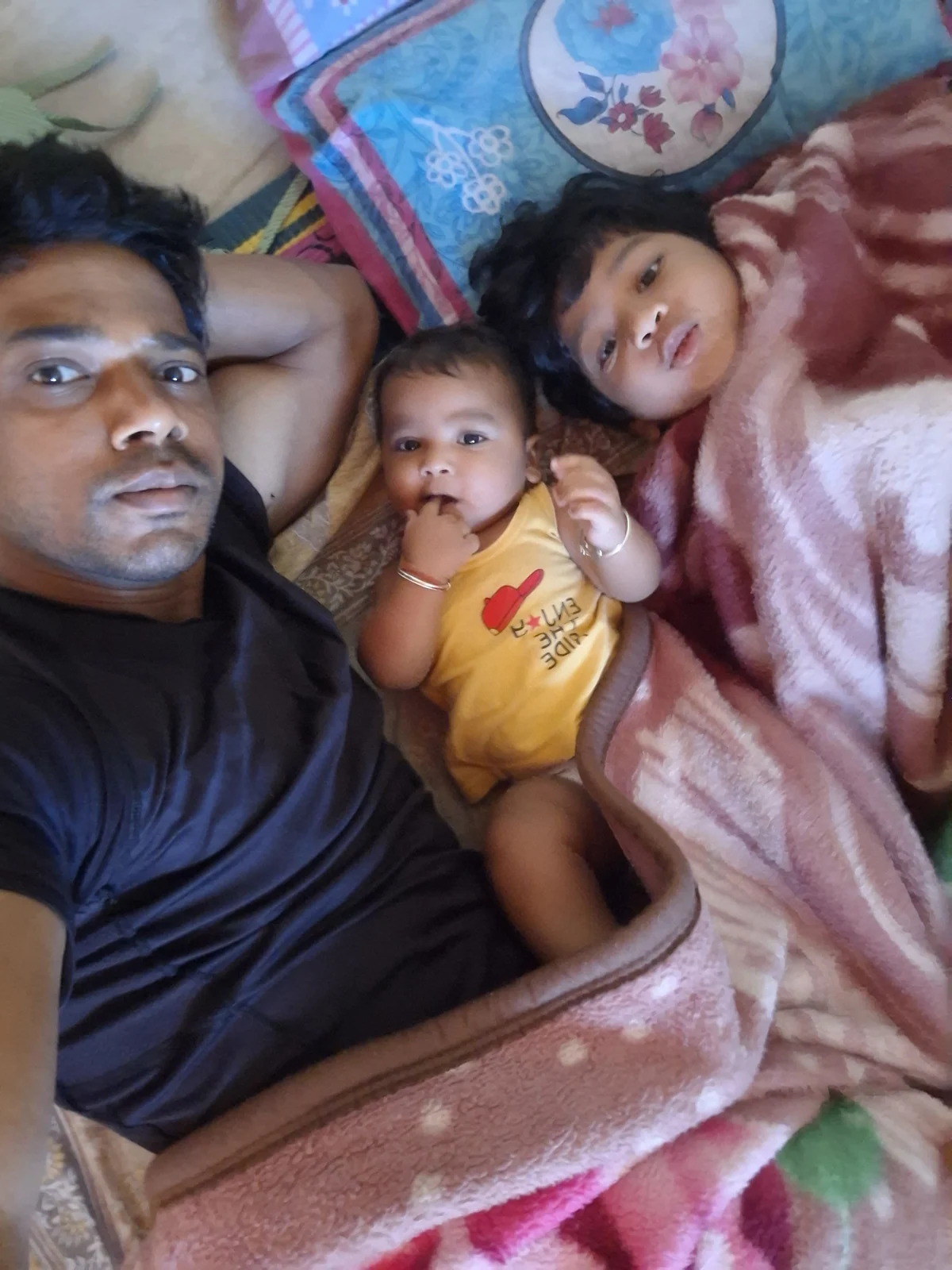 Our little one cuddling with family